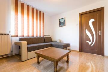 Фото номера Семейный номер-студио Гостевой дом Casa de vacanta Jeny г. Новач-Стрэйни 5