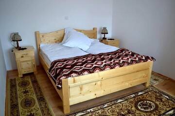 Фото номера Дом с 3 спальнями Дома для отпуска Casa Darius г. Новач-Стрэйни 56